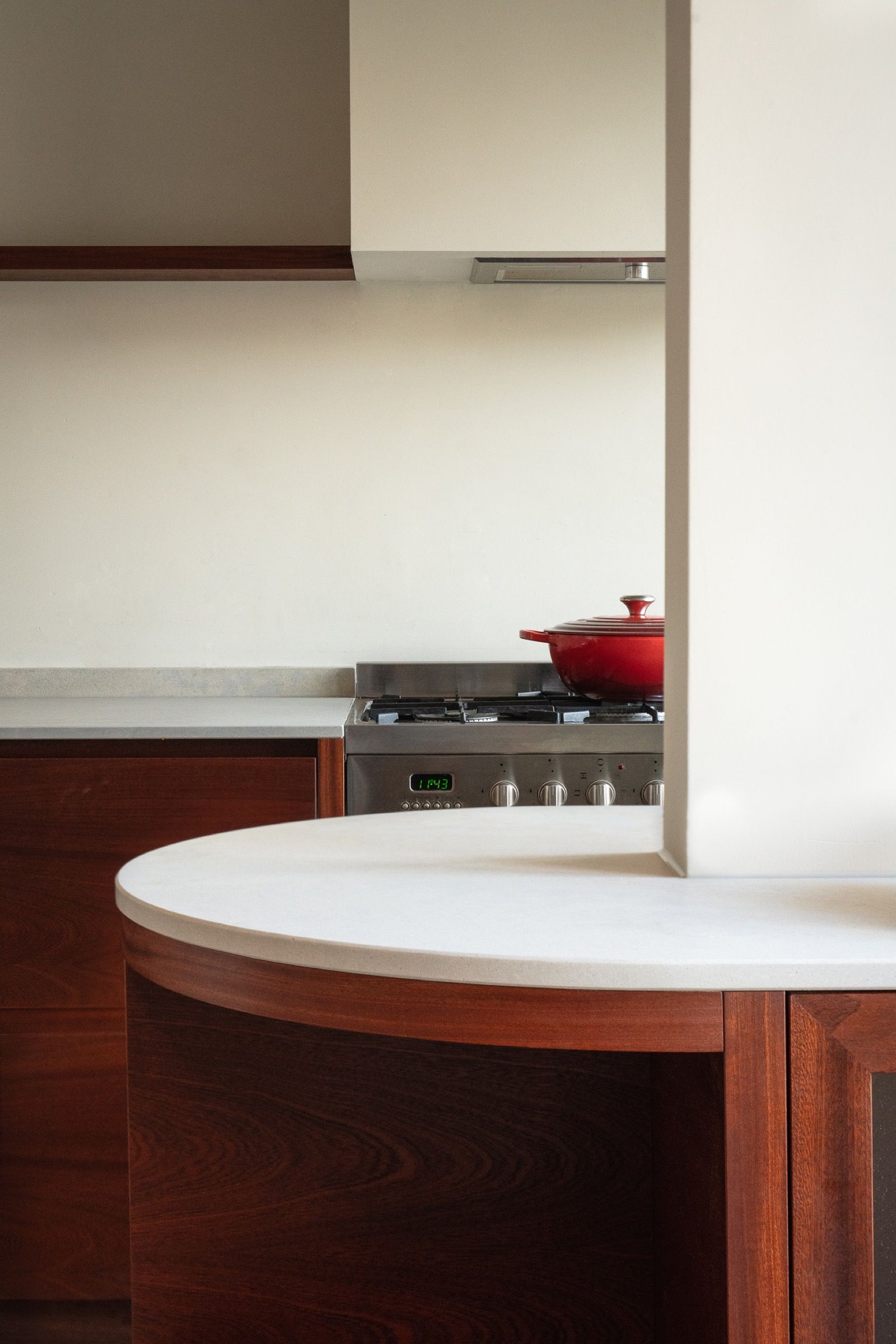 Kitchen island in mahogany with a honed limestone top, canal house, Amsterdam